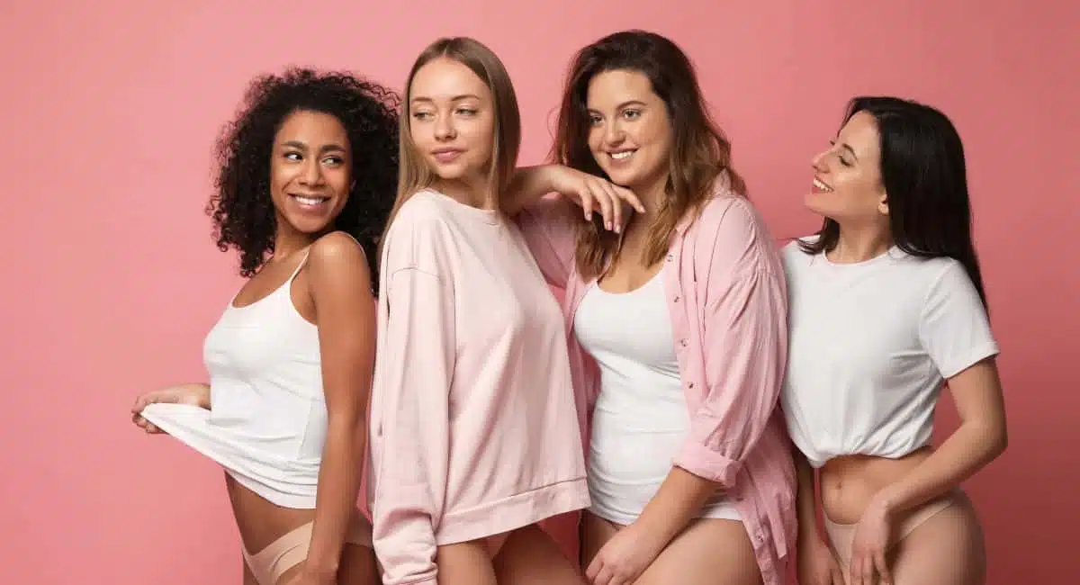 a group of cheerful women with different body shapes