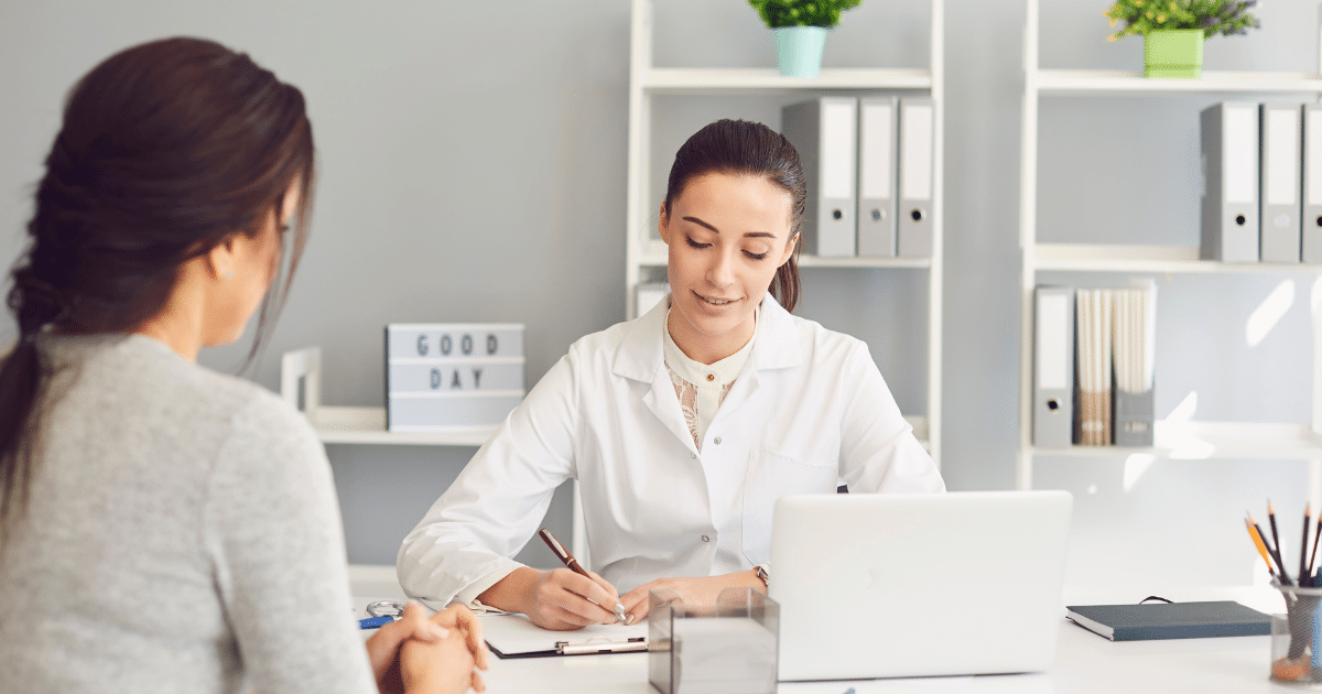 Dr. consultation with a patient in a med spa setting