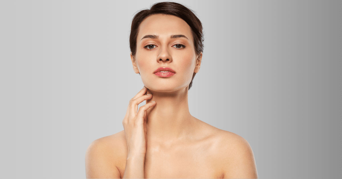 Dermatology aesthetic feminine apply trap Botox injection clean clear sensual healthy gel balm back concept. Close up half-turned portrait of beautiful lady with flawless skin isolated background