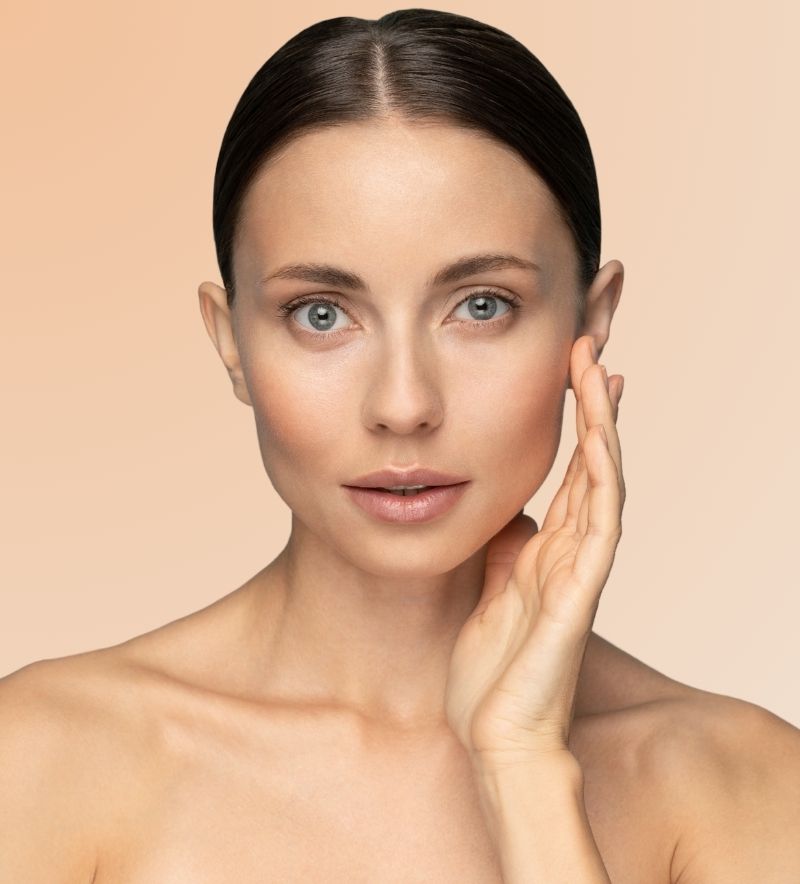 Woman with rejuvenated skin promoting the benefits of Sculptra treatment areas in Newtown Square, PA